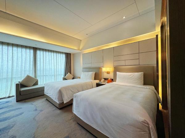 Beijing Xiamenair Jianianhua Hotel : photo 5 de la chambre chambre lits jumeaux avec vue