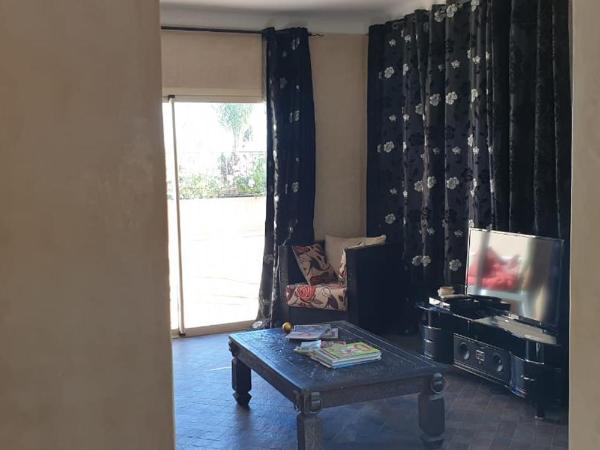 Maison d'Hôtes à Marrakech : photo 10 de la chambre chambre lit king-size - vue sur piscine 