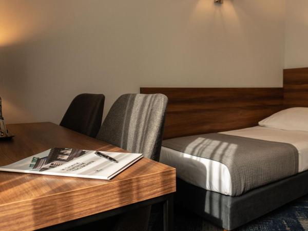 Hotel Oliwski : photo 5 de la chambre chambre lits jumeaux