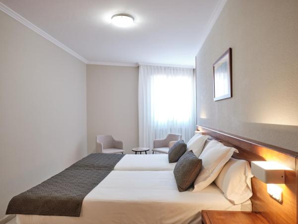 Hotel San Lorenzo : photo 6 de la chambre chambre lits jumeaux