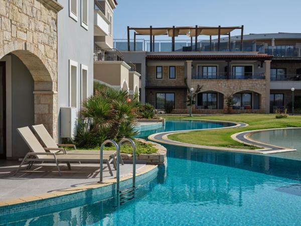 Atlantica Caldera Palace : photo 4 de la chambre suite familiale avec accès direct à la piscine - vue sur terres