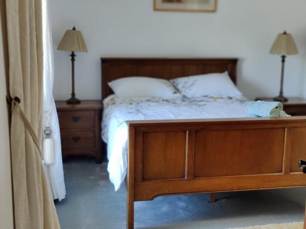 Carney House : photo 1 de la chambre chambre lit queen-size - vue sur jardin