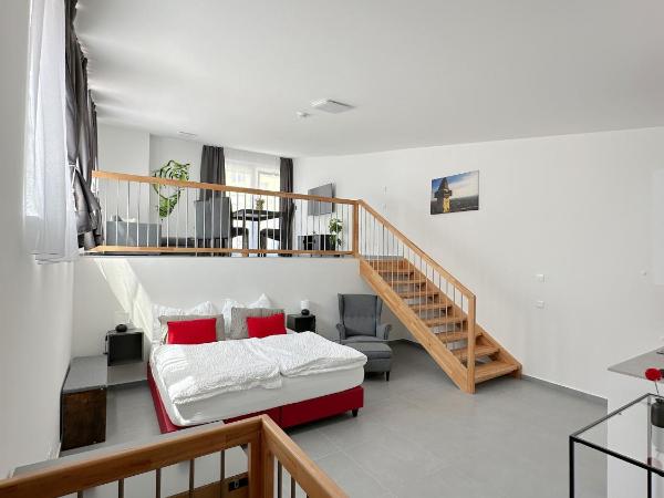 Grazora Living Apartments : photo 1 de la chambre suite avec balcon