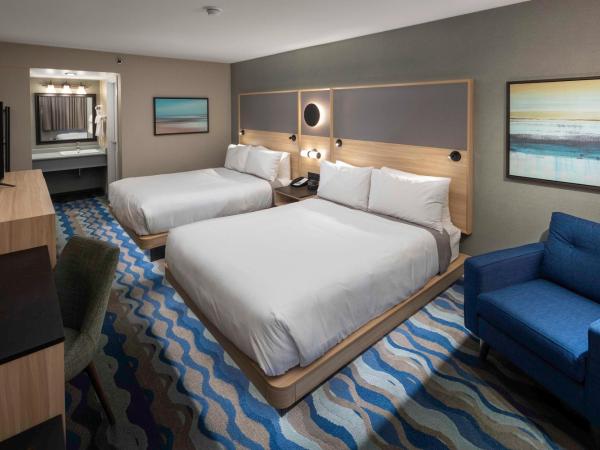 Accent Inns Vancouver Airport : photo 1 de la chambre hébergement 2 lits queen-size