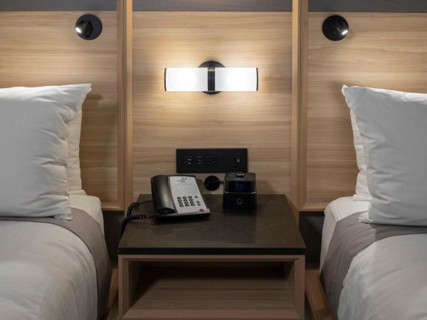 Accent Inns Victoria : photo 2 de la chambre hébergement 2 lits queen-size