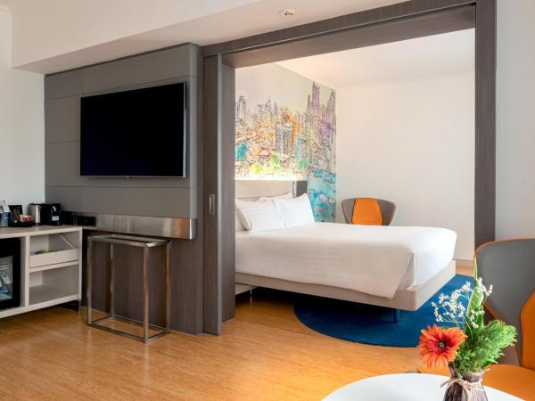 Novotel Bangkok on Siam Square : photo 2 de la chambre suite junior avec lit queen-size