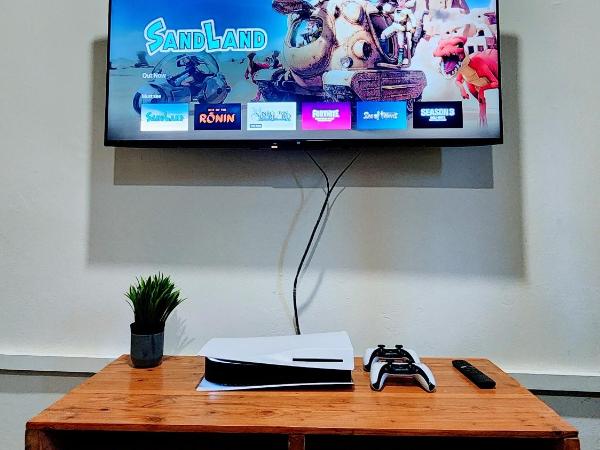 Upspot Kuching Waterfront Premium Hostel : photo 1 de la chambre chambre lit queen-size