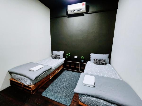 Upspot Kuching Waterfront Premium Hostel : photo 4 de la chambre chambre double Économique