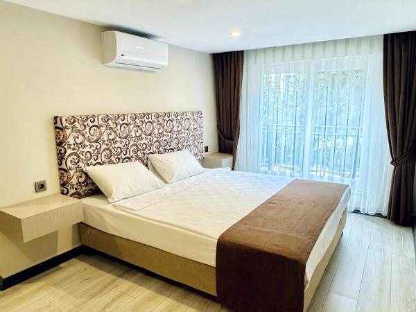 Toprak City Hotel Antalya : photo 1 de la chambre chambre double - vue sur jardin