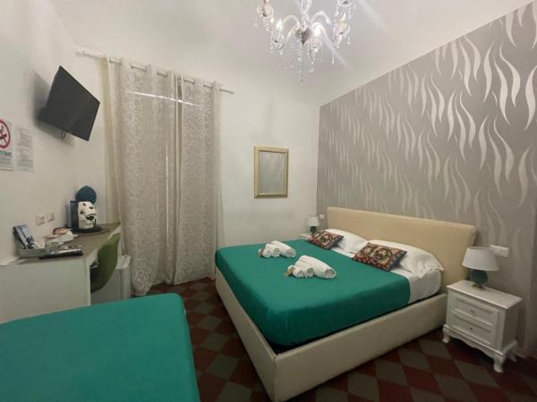Sleep Inn Catania rooms - Affittacamere : photo 7 de la chambre chambre triple deluxe