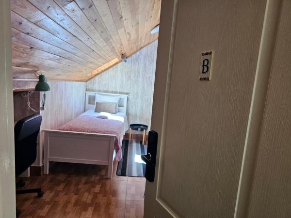 Graça Guest House : photo 3 de la chambre chambre simple avec salle de bains extérieure privative