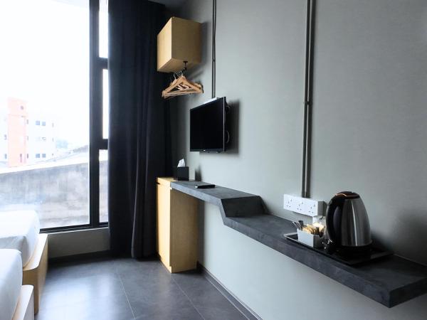 Rucksack Inn Premium Melaka : photo 9 de la chambre chambre lits jumeaux standard