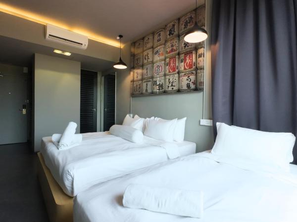 Rucksack Inn Premium Melaka : photo 6 de la chambre chambre triple