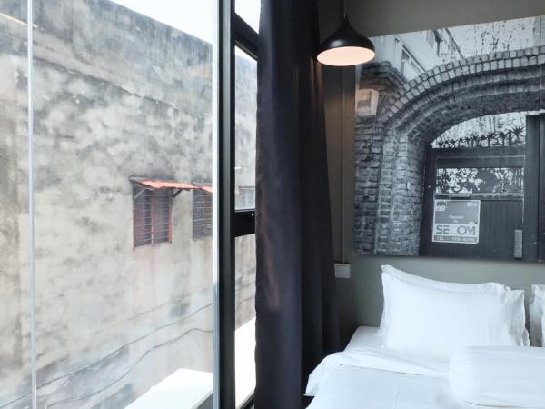 Rucksack Inn Premium Melaka : photo 4 de la chambre suite familiale