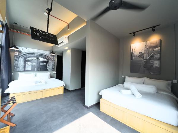 Rucksack Inn Premium Melaka : photo 2 de la chambre suite familiale