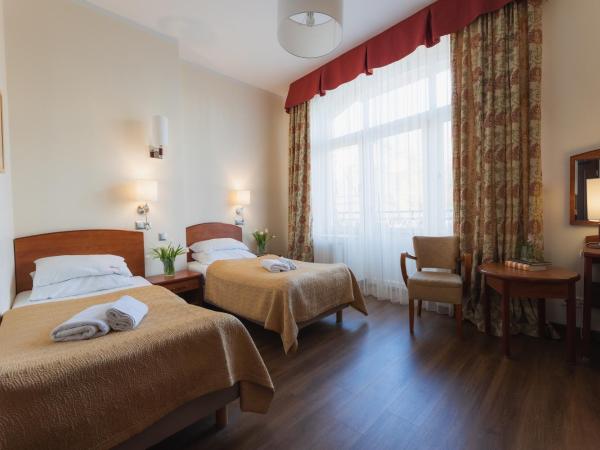 H Villa Herkules : photo 5 de la chambre chambre lits jumeaux