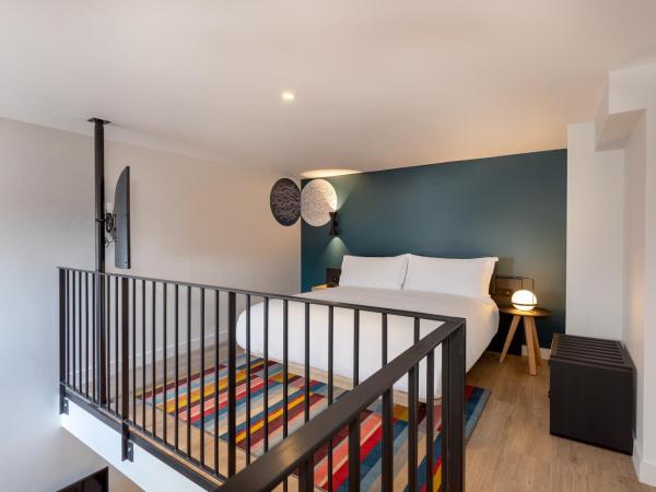 Aloft Hotel, By Marriott : photo 1 de la chambre chambre aloft en duplex avec lit king-size, canapé-lit et vue sur ville - accès au spa inclus