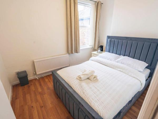 Majestic Inn : photo 6 de la chambre chambre double avec salle de bains commune