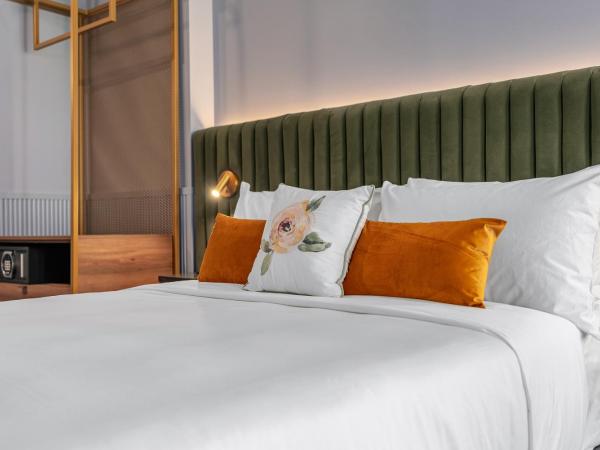 Hôtel Maurice : photo 1 de la chambre chambre lit queen-size avec balcon