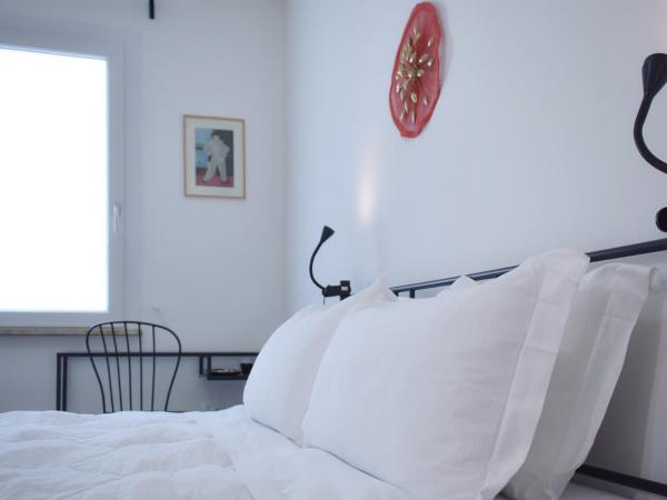 Welc-ōM Padova Panta Rei rooms : photo 9 de la chambre chambre lit king-size