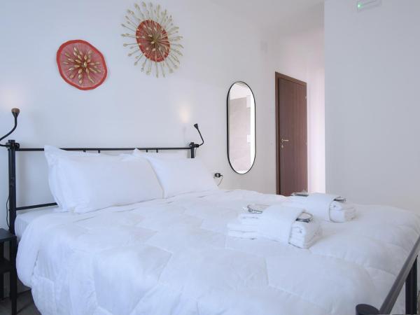 Welc-ōM Padova Panta Rei rooms : photo 4 de la chambre chambre lit king-size