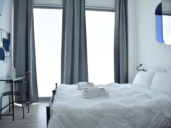 Welc-ōM Padova Panta Rei rooms : photo 10 de la chambre chambre double