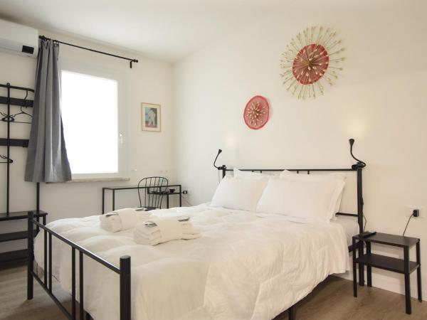 Welc-ōM Padova Panta Rei rooms : photo 2 de la chambre chambre lit king-size