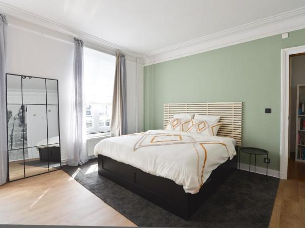 La chambre de Sam - Chambre lit 180 avec SDB privée proche centre ville : photo 1 de la chambre chambre double avec salle de bains privative