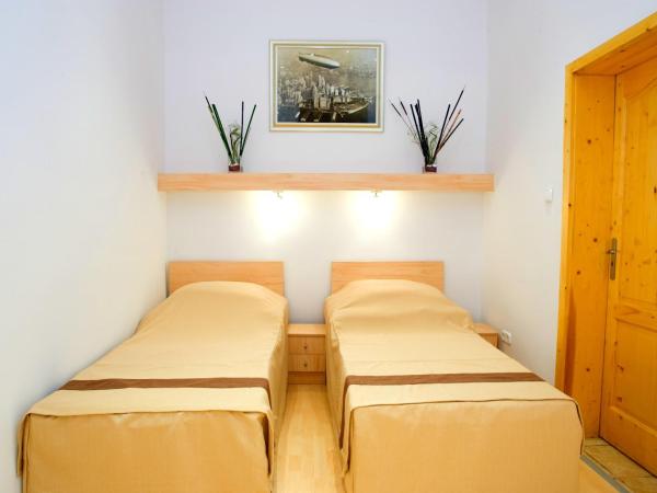 Centrooms House : photo 2 de la chambre chambre double ou lits jumeaux