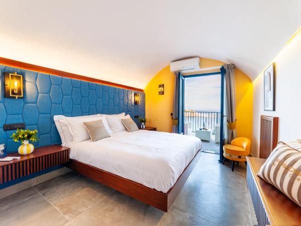 Punta Chiarito Resort : photo 4 de la chambre suite avec baignoire spa