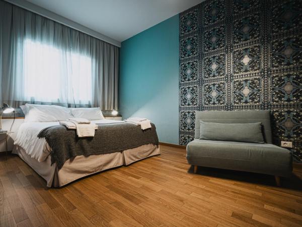 TORTE & LINI : photo 1 de la chambre chambre double ou lits jumeaux avec salle de bains privative externe