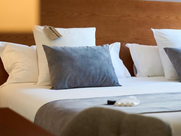 Hotel Puerta de Toledo : photo 4 de la chambre chambre double ou lits jumeaux