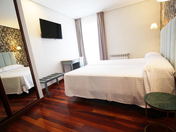 Hostería de Adarzo : photo 2 de la chambre chambre lits jumeaux avec salle de bains privative