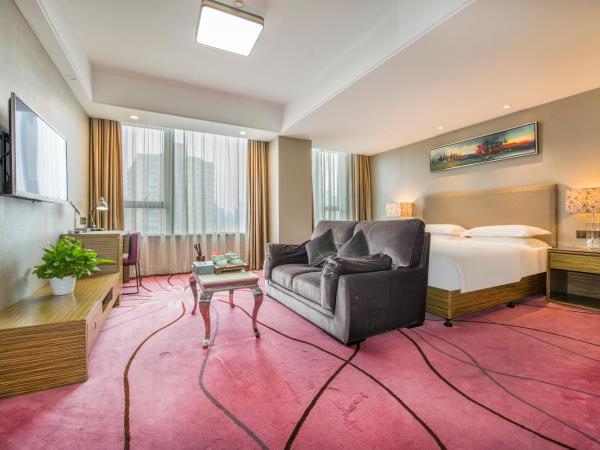 La Perle International Hotel - Free shuttle between hotel and Exhibition Center during Canton Fair & Exhibitor registration Counter : photo 1 de la chambre chambre lit queen-size deluxe