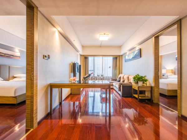 La Perle International Hotel - Free shuttle between hotel and Exhibition Center during Canton Fair & Exhibitor registration Counter : photo 1 de la chambre suite 2 chambres