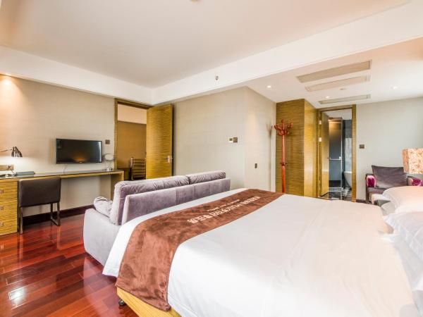 La Perle International Hotel - Free shuttle between hotel and Exhibition Center during Canton Fair & Exhibitor registration Counter : photo 1 de la chambre suite exécutive
