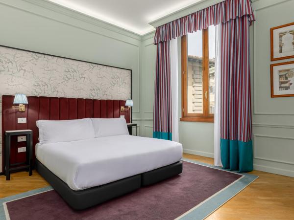 Room Mate Isabella : photo 4 de la chambre chambre deluxe double ou lits jumeaux