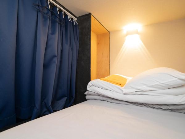 Tokyo Guest House Ouji Music Lounge : photo 1 de la chambre lit superposé dans dortoir mixte