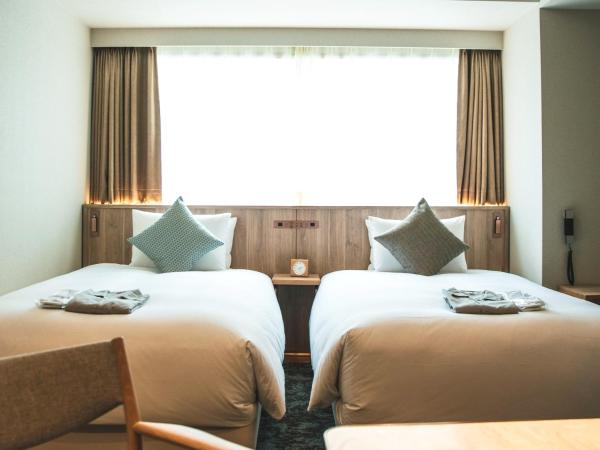 Cross Hotel Sapporo : photo 1 de la chambre chambre lits jumeaux deluxe