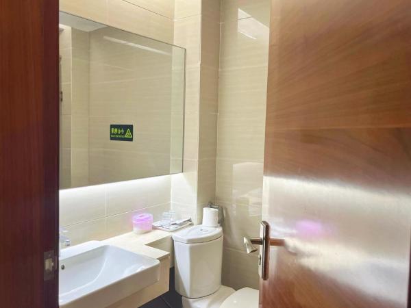 广州沃家国际公寓 : photo 9 de la chambre chambre deluxe double ou lits jumeaux