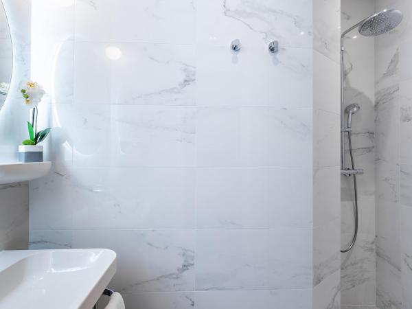 Hotel Astoria - Astotel : photo 6 de la chambre chambre quadruple