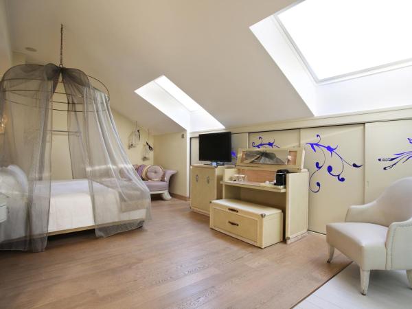 Château Monfort - Relais & Châteaux : photo 2 de la chambre suite junior avec accès au spa