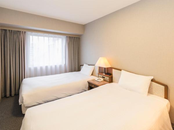 Hotel Sunroute Niigata : photo 1 de la chambre chambre lits jumeaux Économique - fumeurs