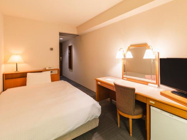 Hotel Sunroute Niigata : photo 2 de la chambre chambre double avec petit lit double - fumeurs