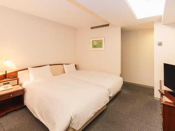 Hotel Sunroute Niigata : photo 2 de la chambre chambre lits jumeaux supérieure - non-fumeurs