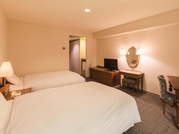 Hotel Sunroute Niigata : photo 1 de la chambre chambre lits jumeaux de luxe - fumeurs