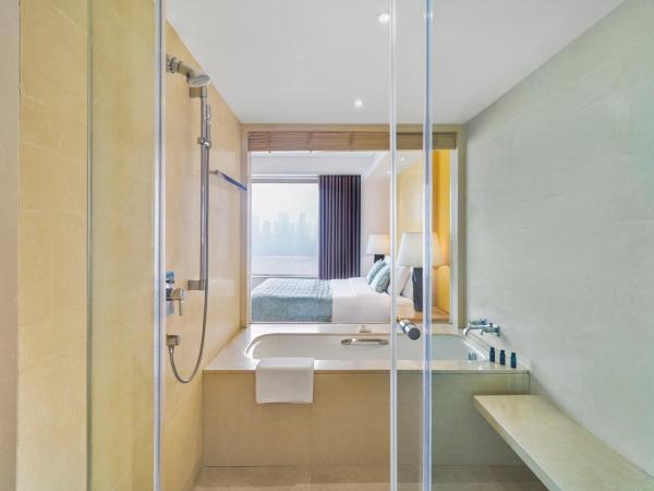 Marco Polo Wuhan : photo 3 de la chambre chambre lit king-size de luxe - vue sur rivière