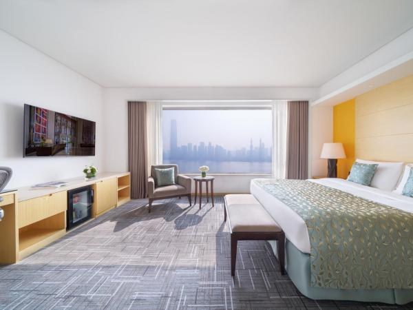 Marco Polo Wuhan : photo 4 de la chambre chambre lit king-size de luxe - vue sur rivière