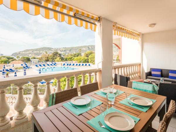 Résidence Pierre & Vacances l'Ange Gardien : photo 2 de la chambre two-bedroom apartment with air conditioning and terrace (7 people) - sea view