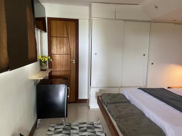 Laguna Hostel : photo 2 de la chambre chambre lit queen-size - vue sur mer